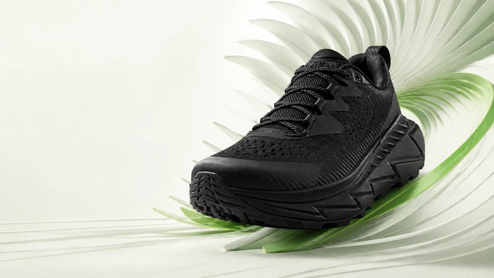 Skyline Max Triple Black shown from the front in a sculptural motion composition